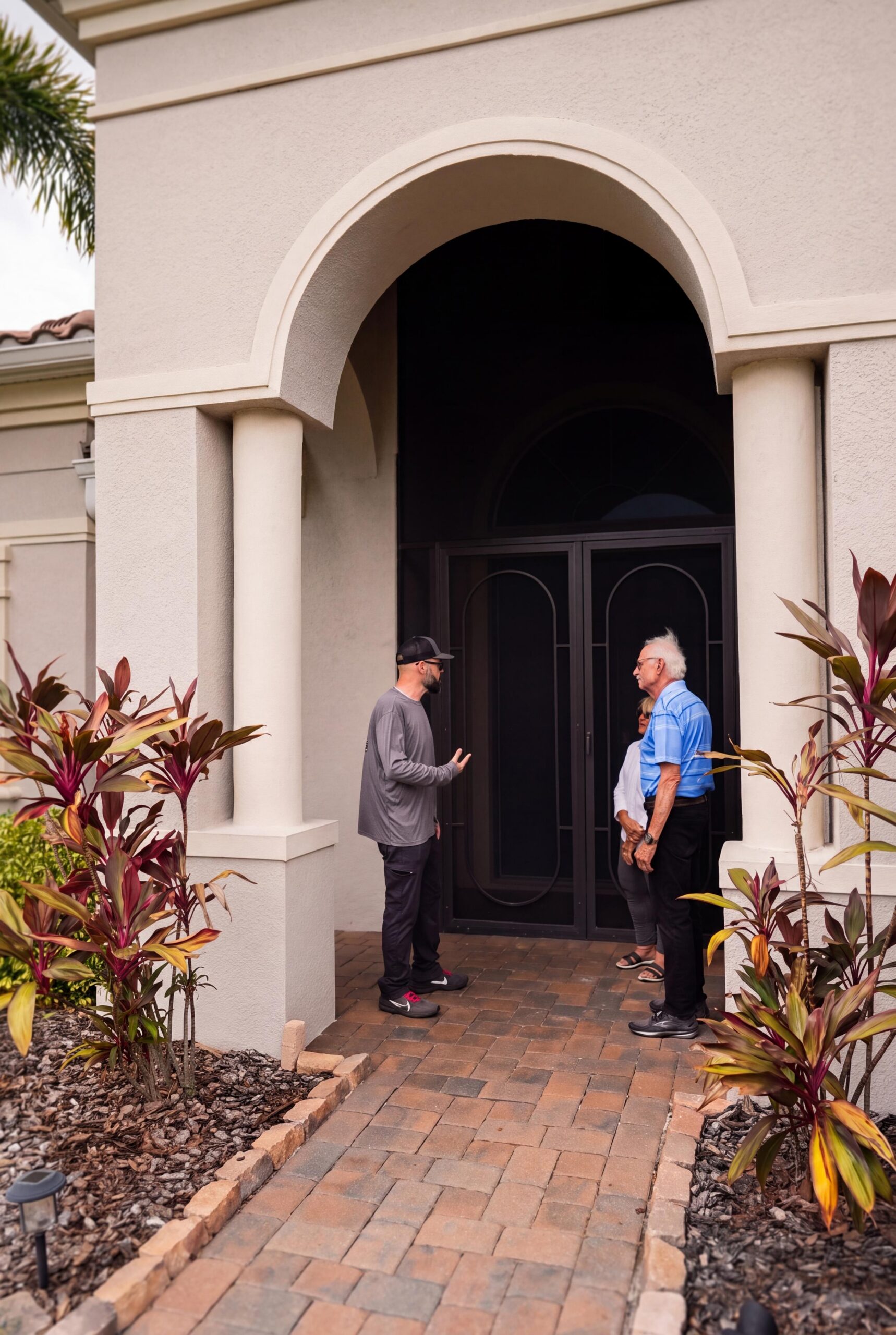 technician does pest control inspection on home in lakewood ranch florida